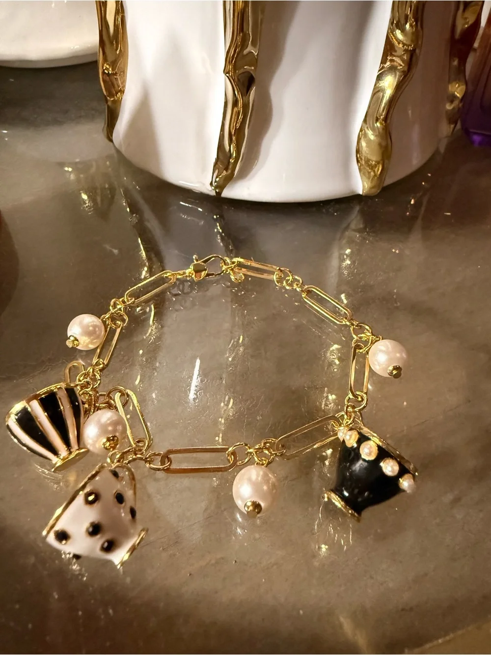 kate spade Gold Charm Bracelet with Black & White Teacup Charms and Pearl Drops
